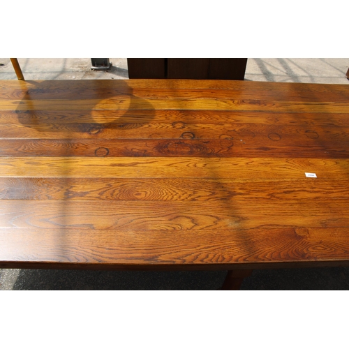 2944 - AN OAK TEN PLANK TOP REFECTORY TABLE ON SIX TURNED LEGS, 10