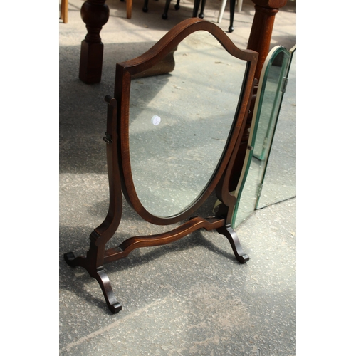 2952 - A SHIELD SHAPED SWING FRAME DRESSING MIRROR AND LATER TRIPLE MIRROR