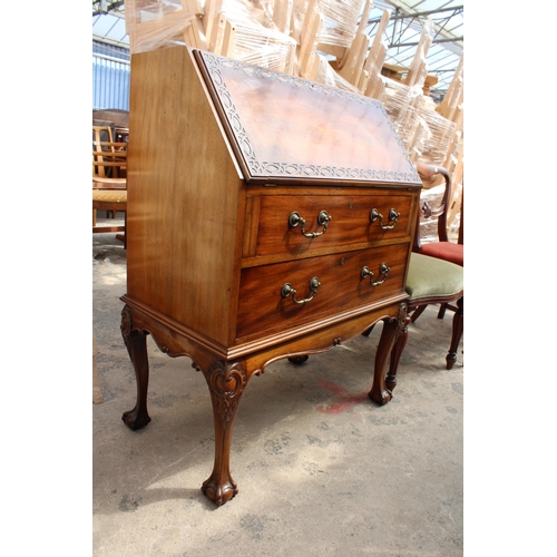 2957 - AN EARLY 20TH CENTURY MAHOGANY BUREAU ON CABRIOLE LEGS WITH BALL AND CLAW FEET, 30