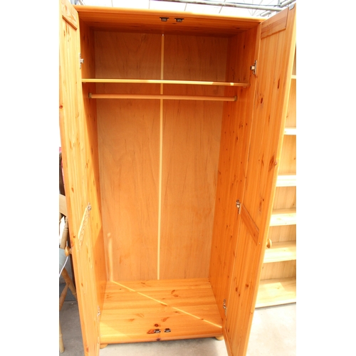 2965 - A MODERN PINE TWO DOOR WARDROBE, 34