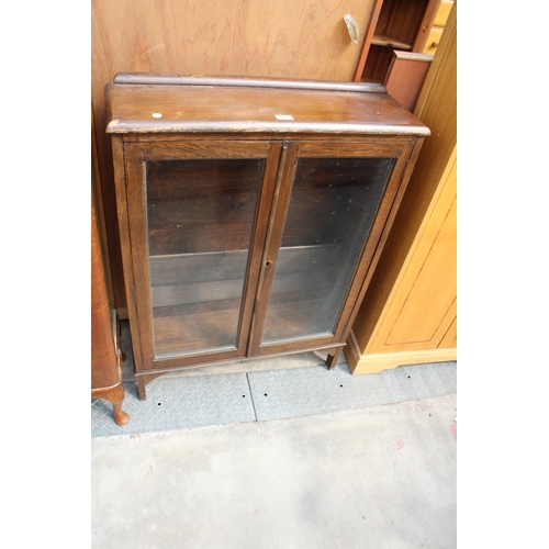 2978 - A MID 20TH CENTURY OAK TWO DOOR GLAZED BOOKCASE, 30