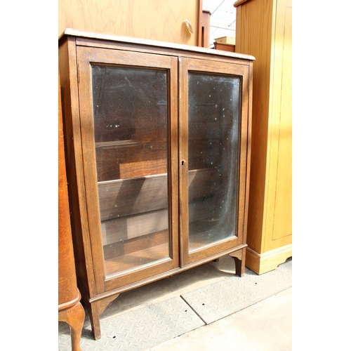 2978 - A MID 20TH CENTURY OAK TWO DOOR GLAZED BOOKCASE, 30