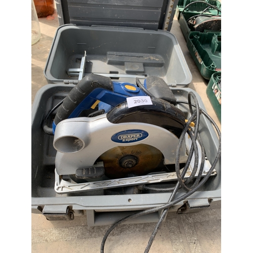 A DRAPER CIRCULAR SAW WITH CARRY CASE AND A TOOL BOX WITH AN ASSORTMENT ...