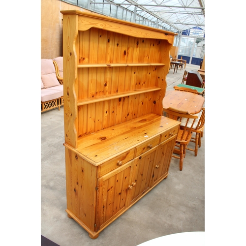 2999 - A MODERN PINE DRESSER WITH PLATE RACK, THREE CUPBOARDS AND THREE DRAWERS TO BASE, 51