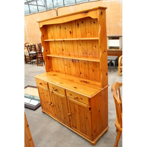 2999 - A MODERN PINE DRESSER WITH PLATE RACK, THREE CUPBOARDS AND THREE DRAWERS TO BASE, 51