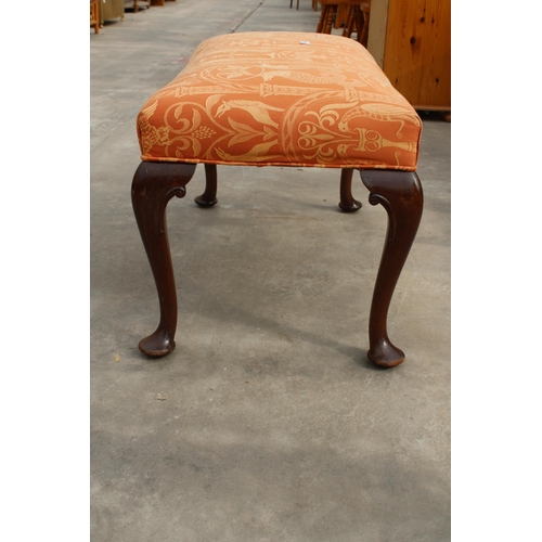 3002 - A MAHOGANY STOOL ON CABRIOLE LEGS WITH PAD FEET, 36