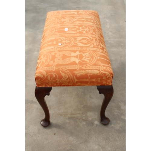 3002 - A MAHOGANY STOOL ON CABRIOLE LEGS WITH PAD FEET, 36