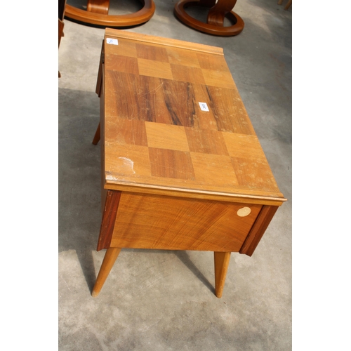 3005 - A RETRO TEAK SEWING BOX / TABLE ON KICK-OUT LEGS, 27