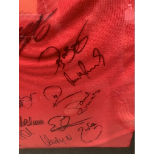 77 - A SIGNED MANCHESTER UNITED FOOTBALL SQUAD PLAYER'S T-SHIRT DATED 10/2/08 WITH CERTIFICATE OF AUTHENT... 