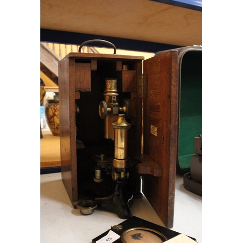 64 - A BRASS MAHOGANY CASED MICROSCOPE