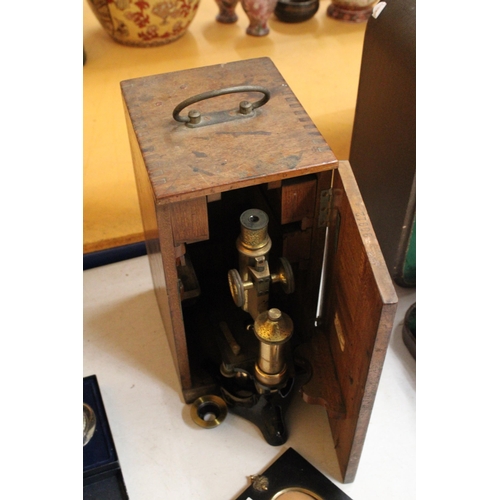 64 - A BRASS MAHOGANY CASED MICROSCOPE