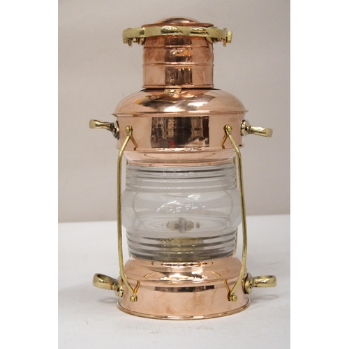 33 - A VINTAGE NAUTICAL BRASS AND COPPER ANCHOR OIL LAMP