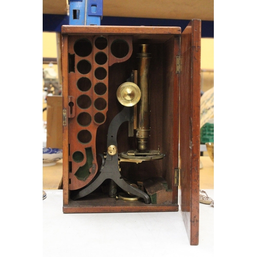 48 - A VINTAGE BRASS MICROSCOPE IN A MAHOGANY CASE