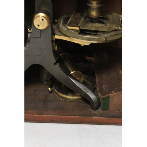 48 - A VINTAGE BRASS MICROSCOPE IN A MAHOGANY CASE