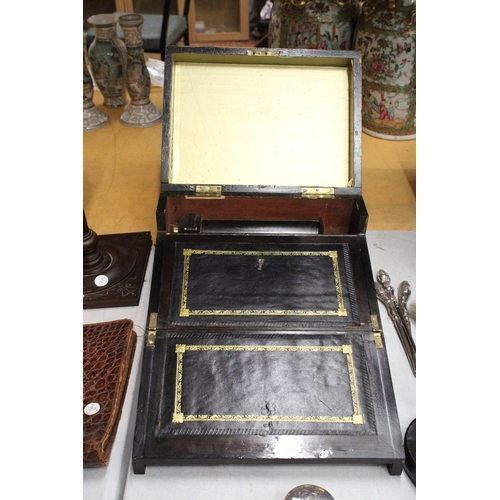 58 - A 19TH CENTURY WALNUT AND BRASS BANDED WRITING SLOPE