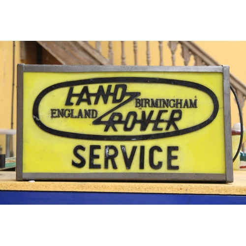 66 - AN ILLUMINATED LAND ROVER BIRMINGHAM ENGLAND SERVICE SIGN - 52 X 28 CM