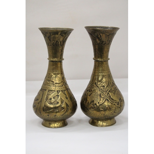 105 - A PAIR OF MIDDLE EASTERN BRASS VASES, HEIGHT 29CM