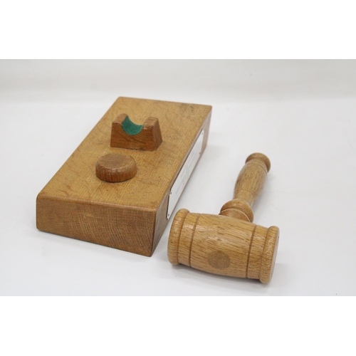 109 - A WOODEN GAVEL AND BLOCK