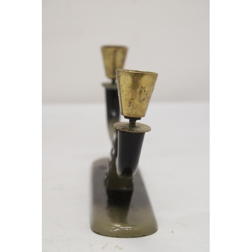 216 - AN ISRAELI DESIGNER METAL CANDLESTICKS BY PAL-BELL