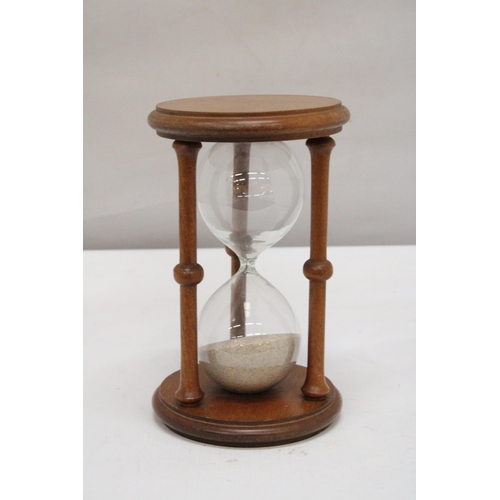 237 - A LARGE WOODEN GLASS EGG TIMER