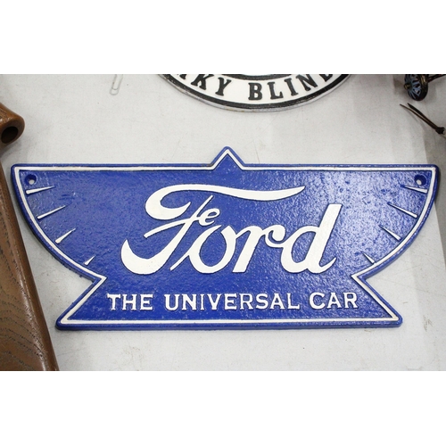 296 - A CAST BLUE FORD SIGN, 38CM X 16CM