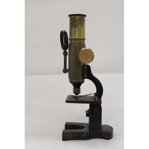 299 - A SCIENTIFIC LABORATORY MICROSCOPE