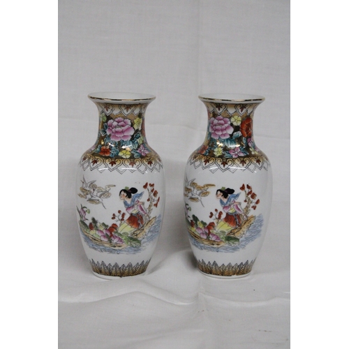 313 - A PAIR OF JAPANESE FAMILLE ROSE GEISHA VASES - 16 CM (H)