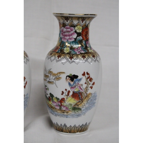 313 - A PAIR OF JAPANESE FAMILLE ROSE GEISHA VASES - 16 CM (H)