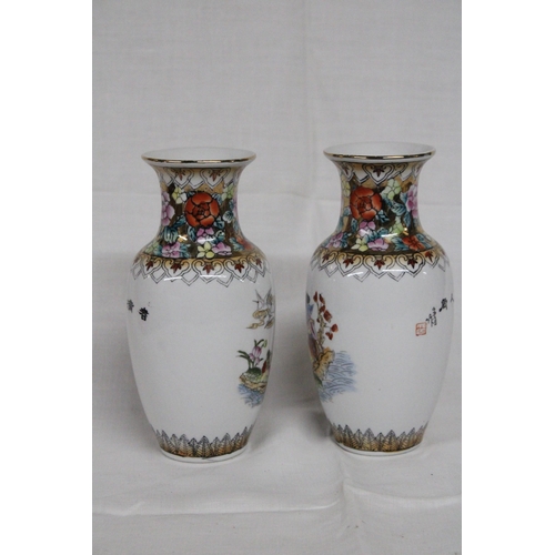 313 - A PAIR OF JAPANESE FAMILLE ROSE GEISHA VASES - 16 CM (H)