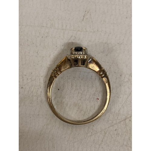 471 - A 9 CT GOLD RING WITH WITH SAPPHIRE AND DIAMONDS - 3.0 G