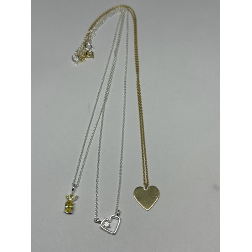 589 - THREE SILVER PENDANT NECKLACES TO INCLUDE A GOLD PLATED EXAMPLE