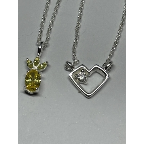 589 - THREE SILVER PENDANT NECKLACES TO INCLUDE A GOLD PLATED EXAMPLE