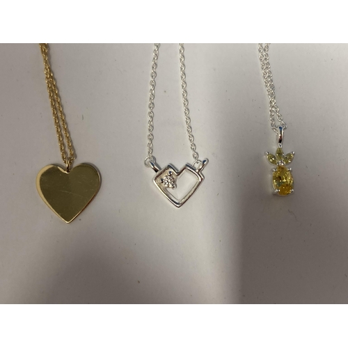 589 - THREE SILVER PENDANT NECKLACES TO INCLUDE A GOLD PLATED EXAMPLE