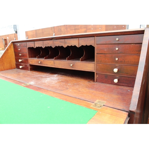 2781 - A GEORGE III MAHOGANY AND CROSSBANDED BUREAU WITH FITTED INTERIOR, TWO SHORT AND THREE LONG GRADUATE... 