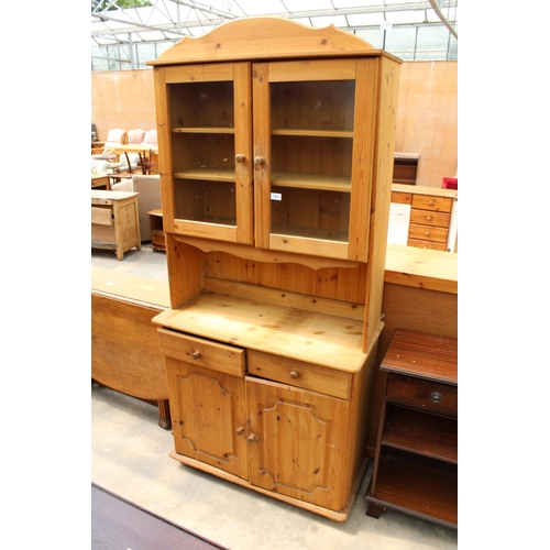 2820 - A PINE KITCHEN DRESSER WITH GLAZED UPPER PORTION, 34