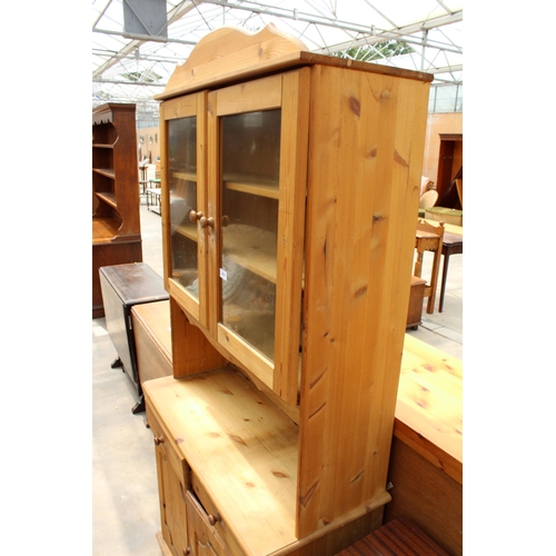 2820 - A PINE KITCHEN DRESSER WITH GLAZED UPPER PORTION, 34