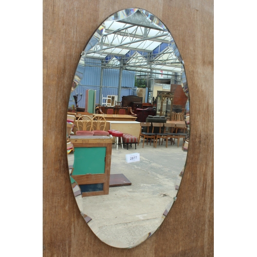 2877 - A FRAMELESS WALL MIRROR, 26