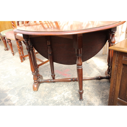 2955 - AN OVAL MAHOGANY SUTHERLAND TABLE, 40