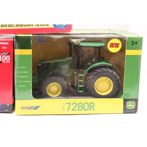 403 - THREE BRITAINS 1:32 SCALE VEHICLES TO INCLUDE A JOHN DEERE 2011 7280R TRACTOR, AN INTERNATIONAL HARV... 