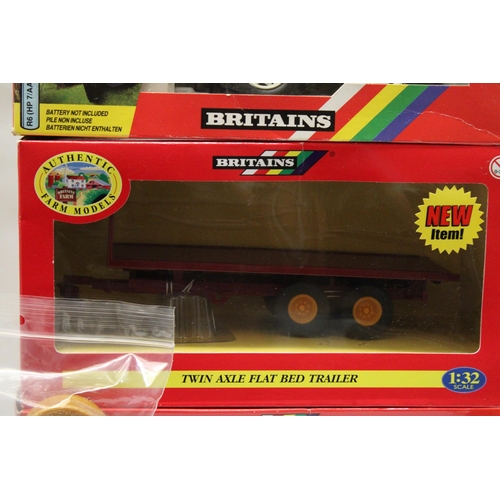 431 - THREE BRITAINS 1:32 SCALE MODELS TO INCLUDE A MOTORISED COUNTY 1884 TRACTOR, A TWIN AXLE FLAT BED TR... 