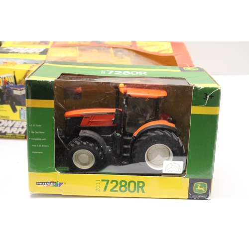 435 - FOUR BRITAINS 1:32 SCALE MODELS TO INCLUDE A MOTORISED NEW HOLLAND COMBINE HARVESTER, A JOHN DEERE 7... 