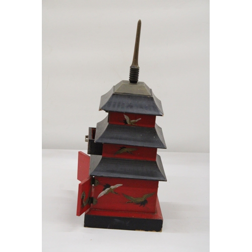 125 - A WOODEN JEWELLERY/MUSIC BOX - THREE STOREY PAGODA - APPROXIMATELY 40CM HIGH