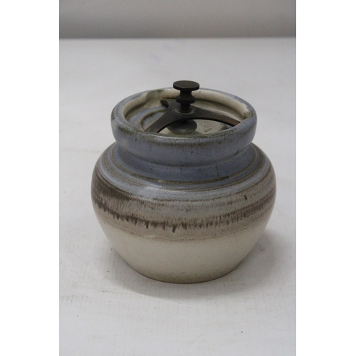 14 - AN AONIAN POTTERY TOBACCO JAR