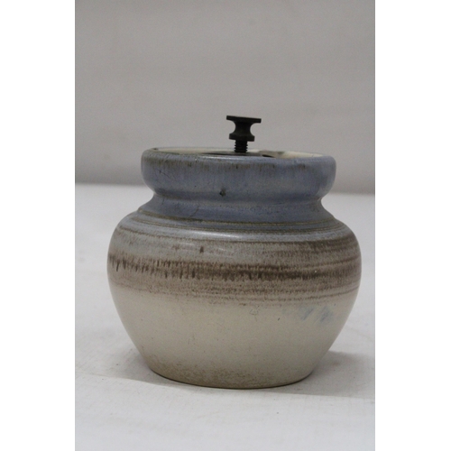 14 - AN AONIAN POTTERY TOBACCO JAR