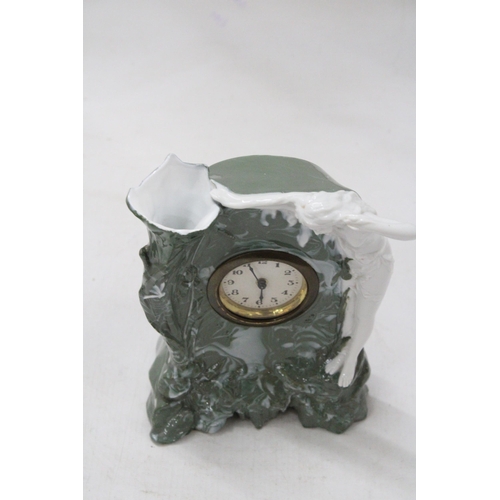 15 - AN ART NOVEAU LADY MANTLE CLOCK