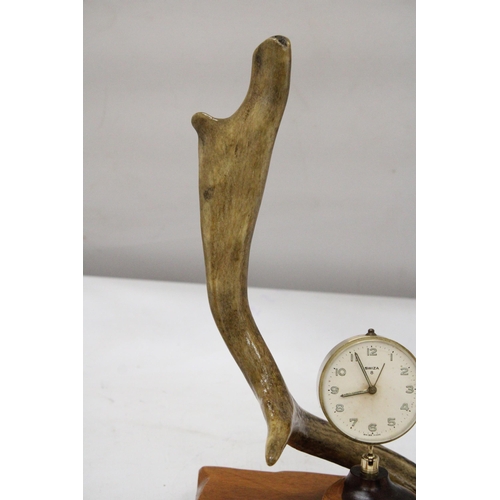 17 - A HORN AND WOOD MANTLE CLOCK