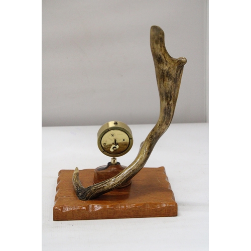 17 - A HORN AND WOOD MANTLE CLOCK