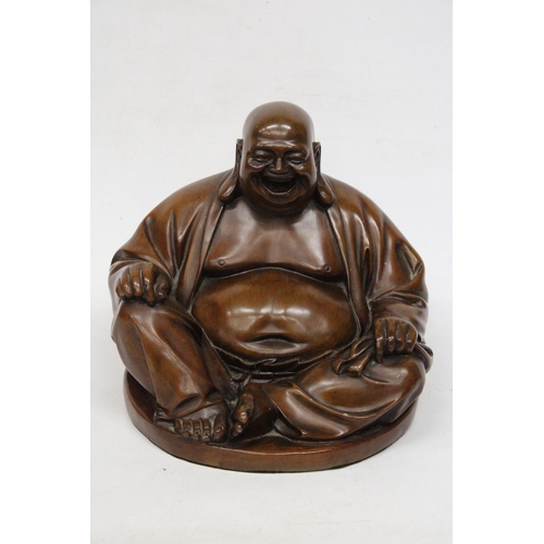 20 - A WOOD SCULPTURE OF A  LARGE LAUGHING BUDDHA