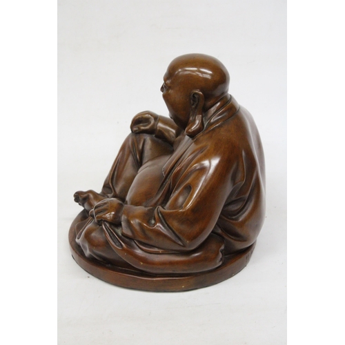 20 - A WOOD SCULPTURE OF A  LARGE LAUGHING BUDDHA