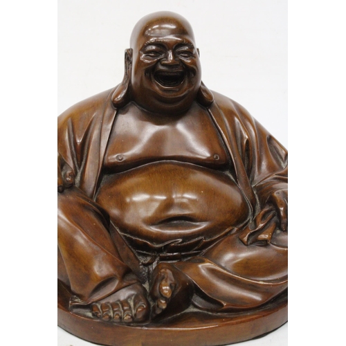 20 - A WOOD SCULPTURE OF A  LARGE LAUGHING BUDDHA